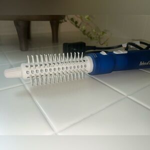 Helen of Troy tangle free hot air brush curling relase button